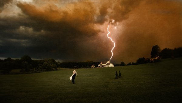 wedding photo by J Garner Photography, storm, gorgeous landscape, bride and groom